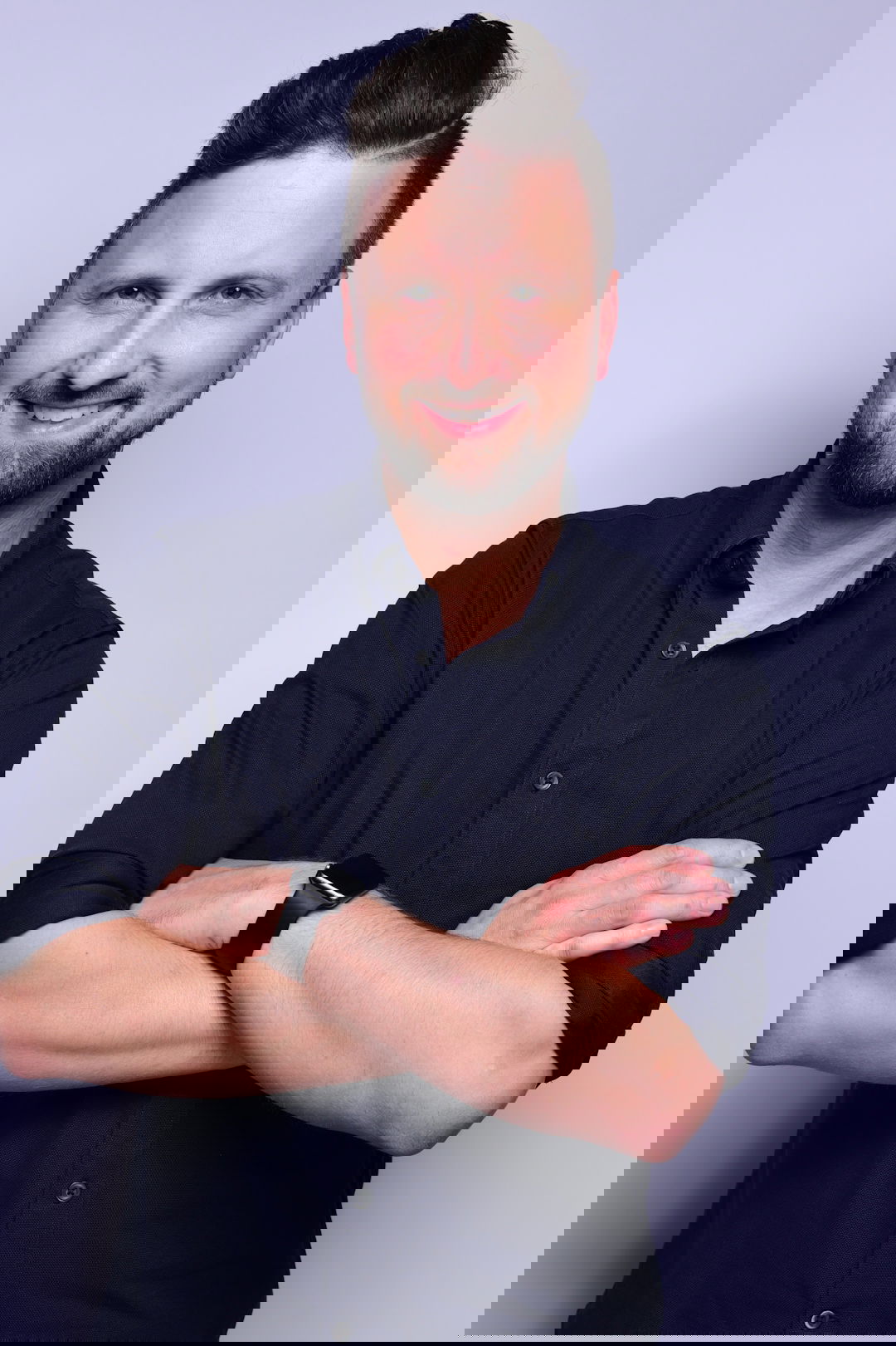 man in black dress shirt wearing black apple watch